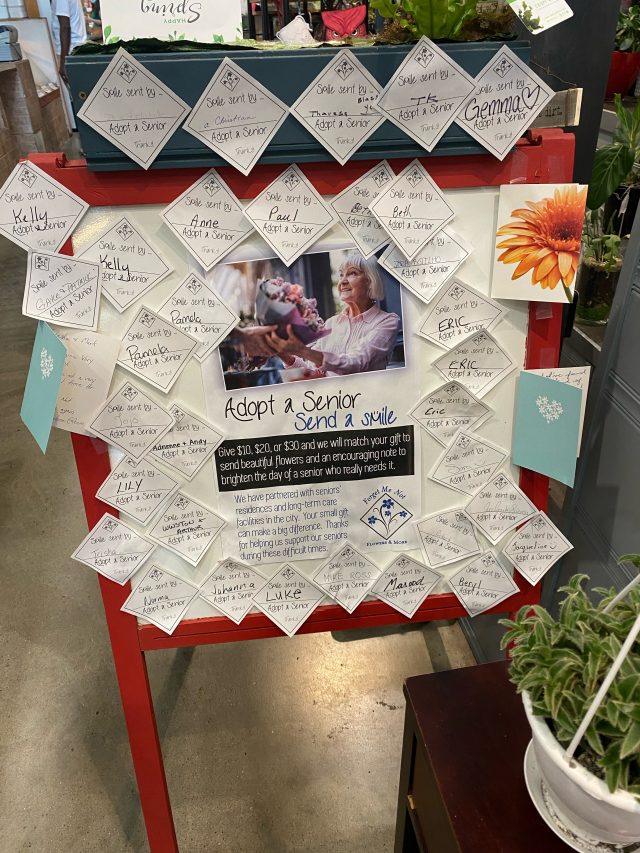 A board of posted messages to Seniors for the "Adopt A Senior" program put on by Forget-Me-Not Flowers